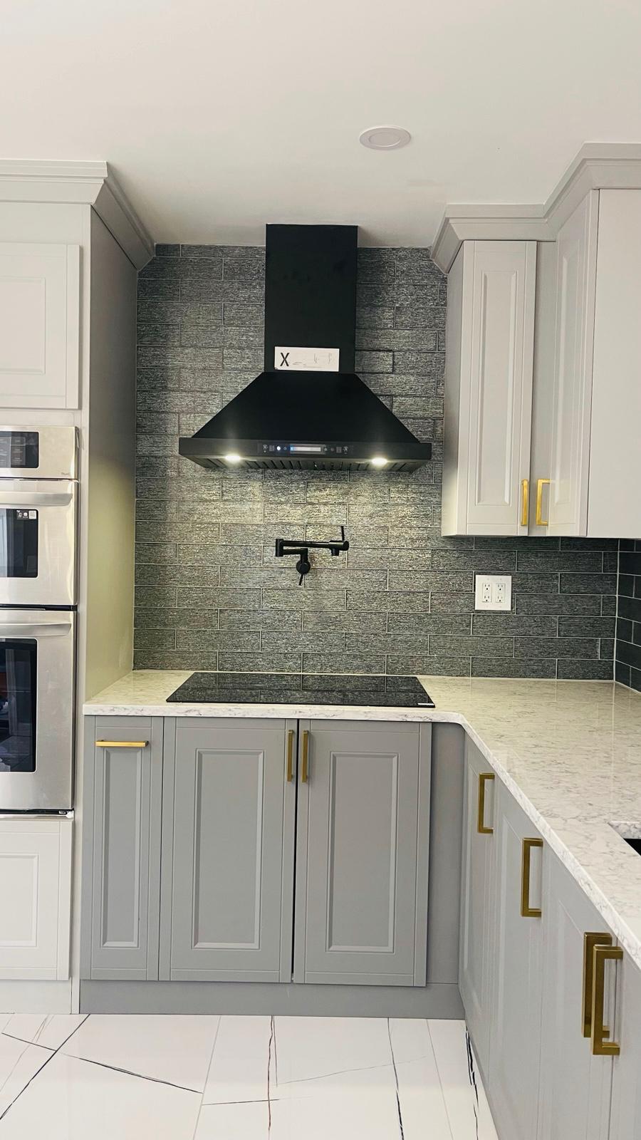 Contemporary Contrast Kitchen: Grey Cabinetry & Industrial Edge